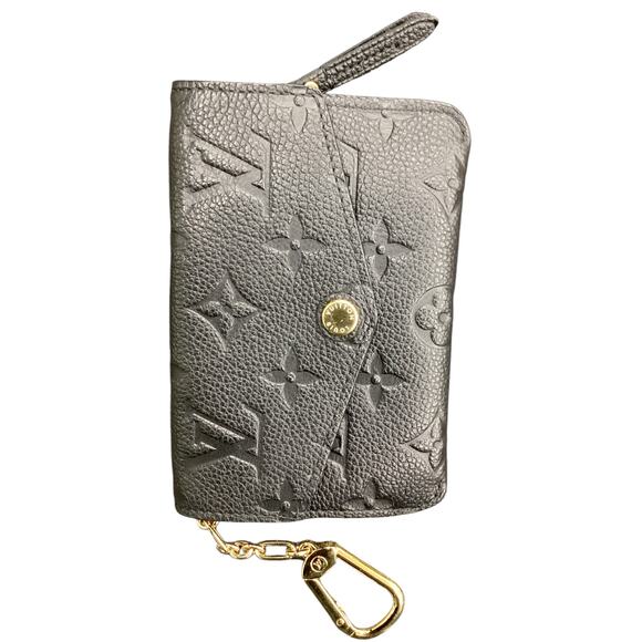 Never Used Louis Vuitton Key Pouch 1Size Imprinted Logo Gold Tone Hardware Black